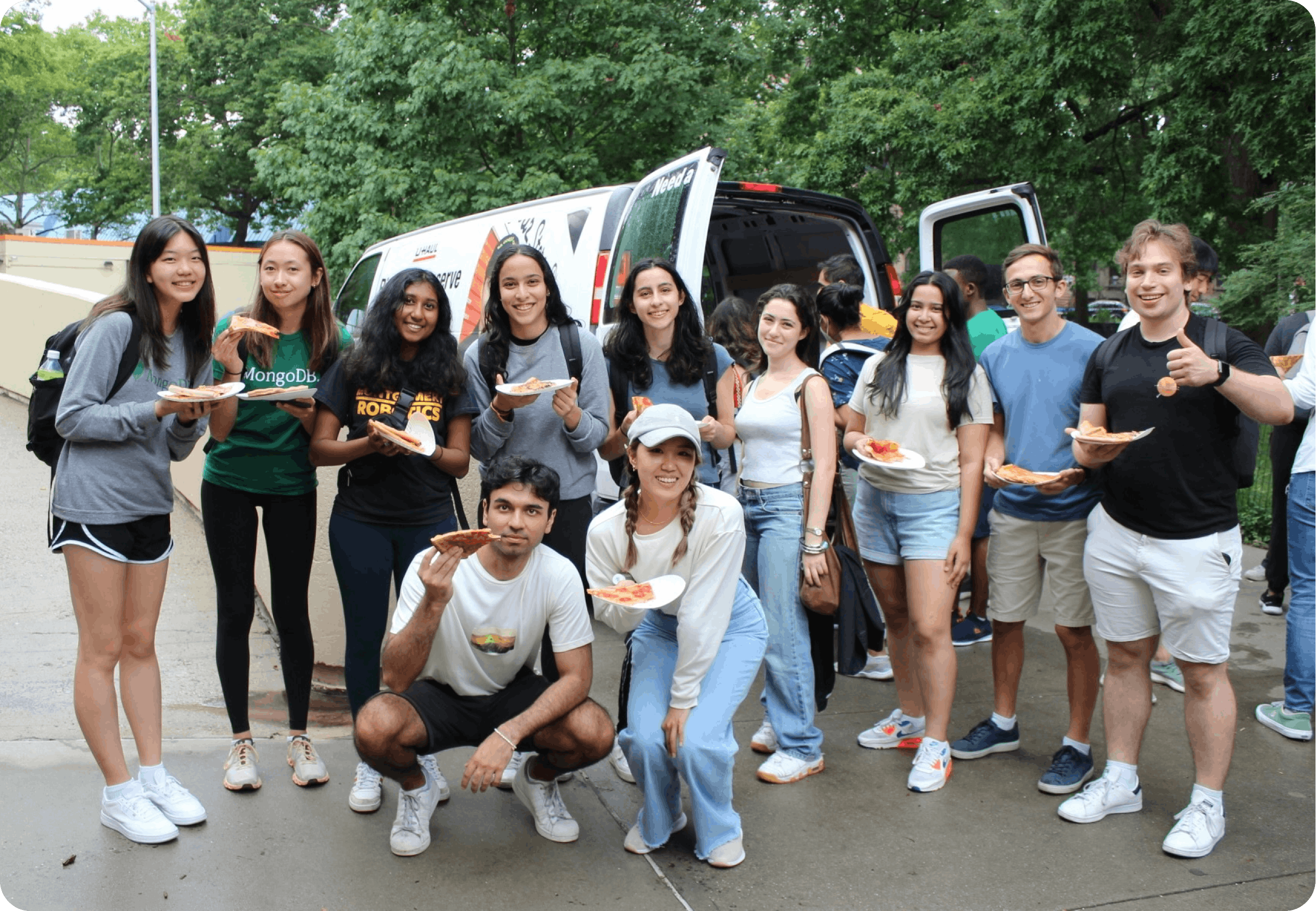 College students eating outside of a university