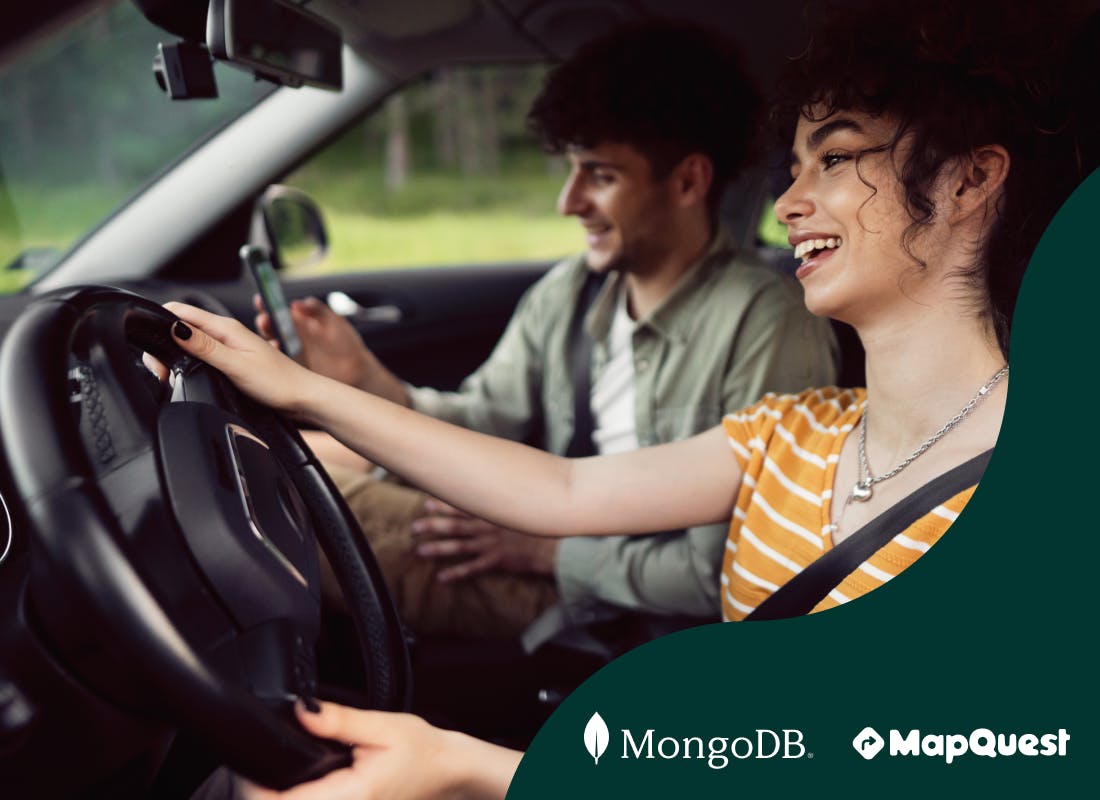 An image of two people are driving a car while looking at a mobile device and discussing.